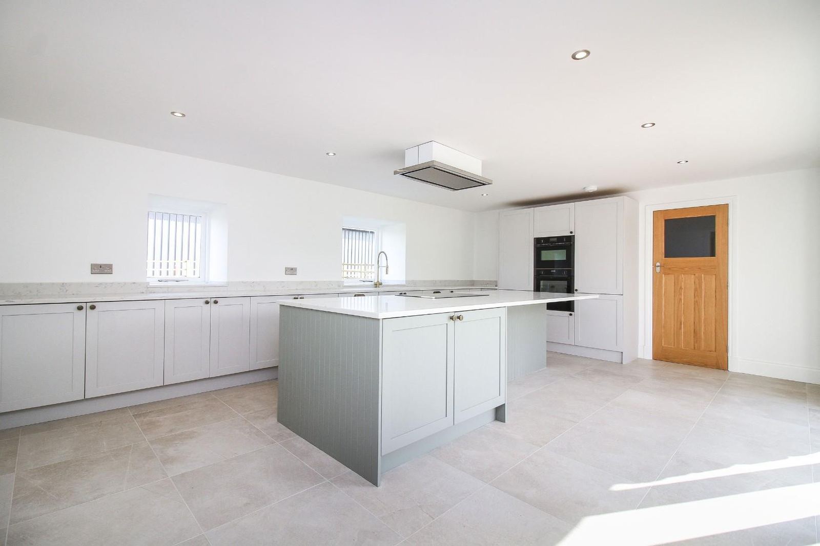 A large kitchen, fitted and finished.