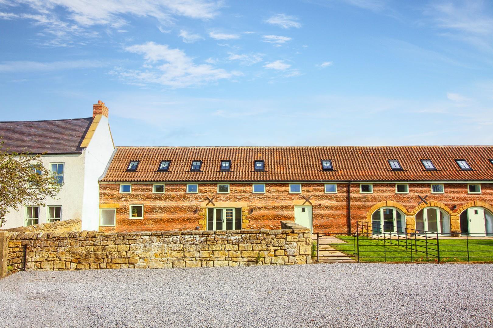 Barn and farmhouse together, from the drive.