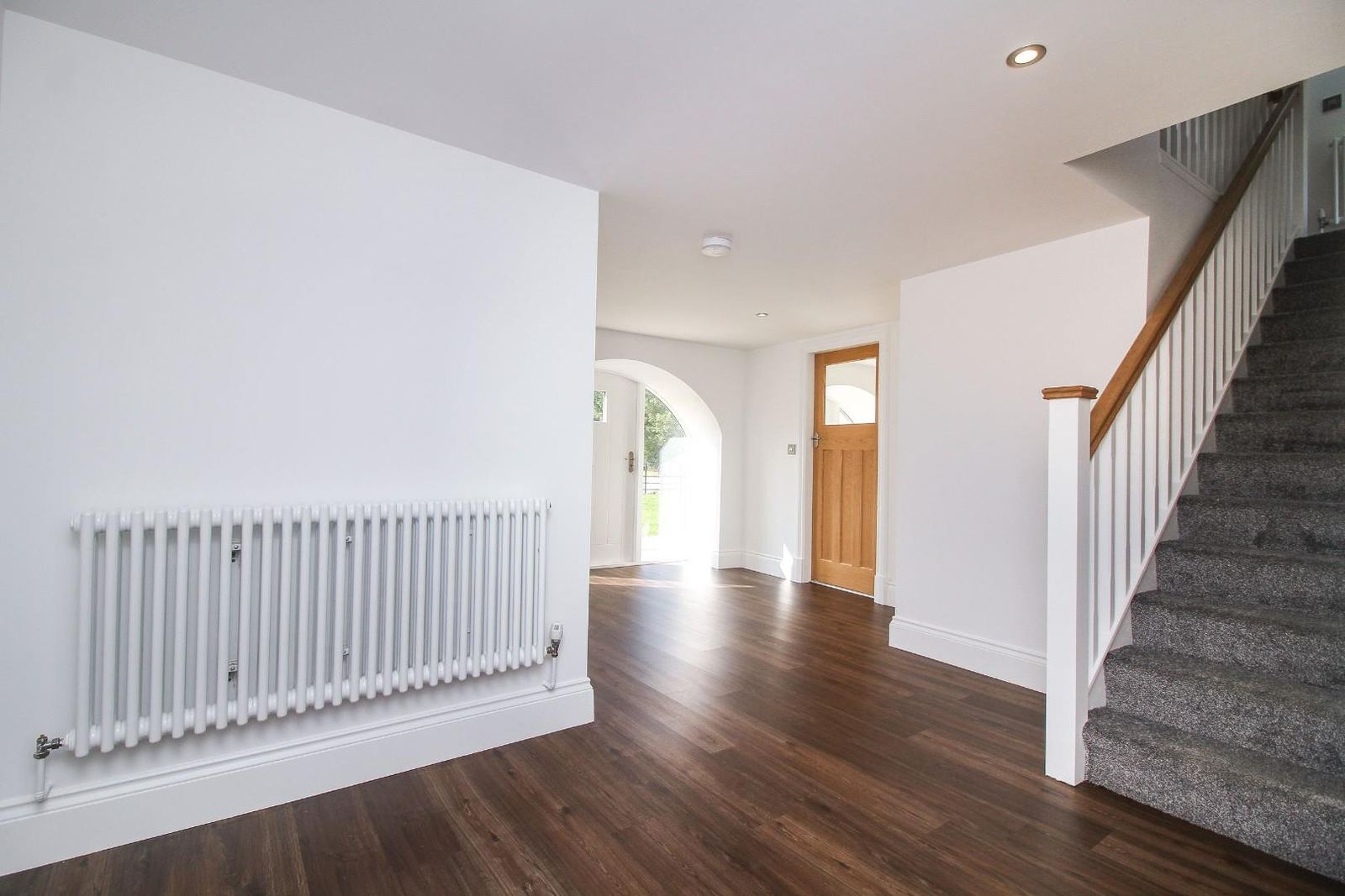 A hallway with its new staircase in, part of a full renovation.